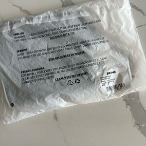 New and sealed! Skims cropped cami gunmetal S fits everybody